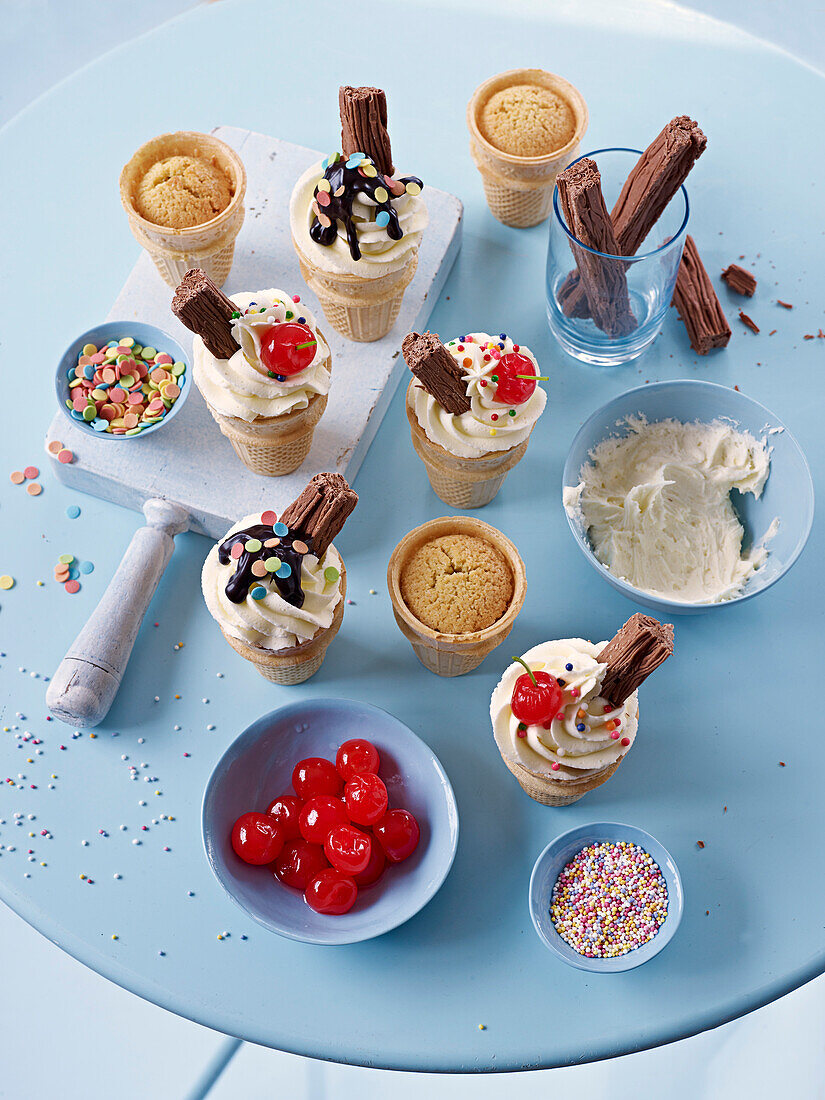 Small ice cream cone cakes with various toppings