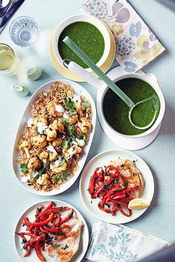 Cauliflower rice with curry, green soup, chicken paillard with peppers