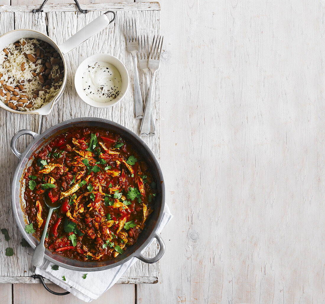 Mexican chicken stew with rice and beans