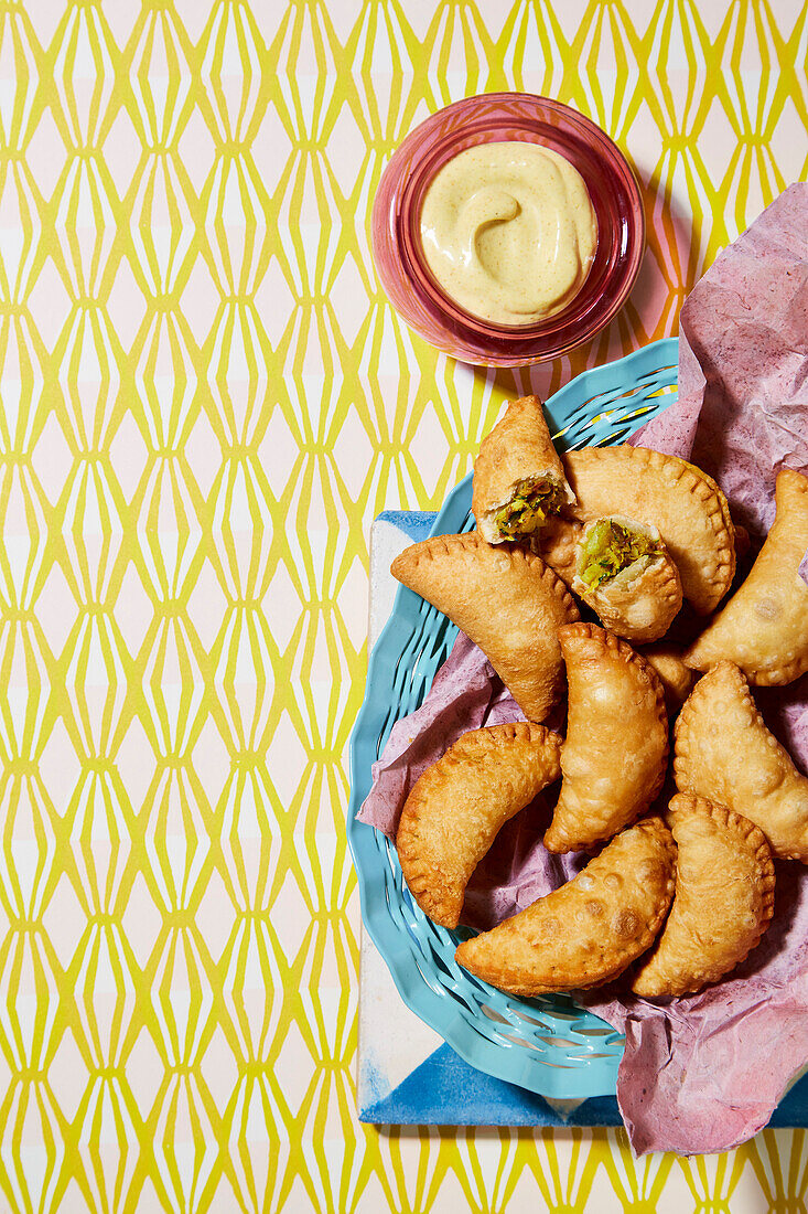 Empanada-style fish cakes with curry aioli