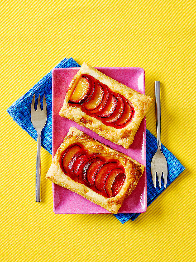 Puff pastry with red plums