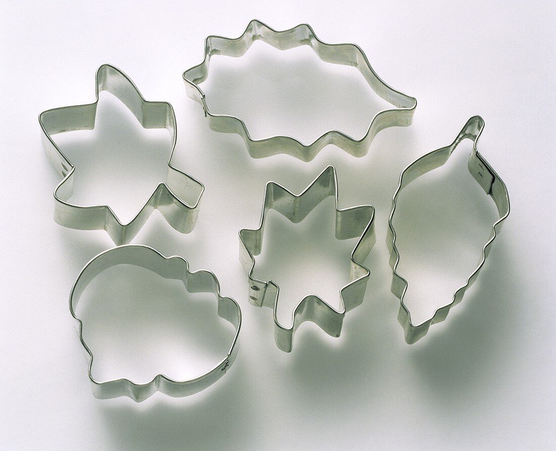 Five different cutters on white background
