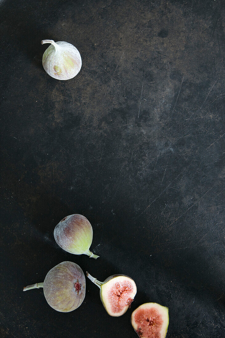 Fresh figs on a black background