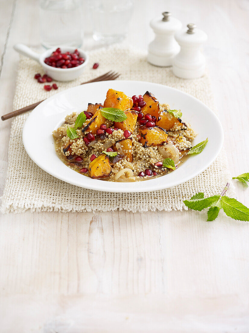 Quinoa stew with pumpkin, plums and pomegranate