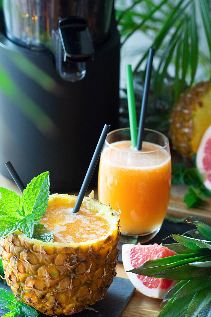 Pineapple juice served in hollowed out pineapple