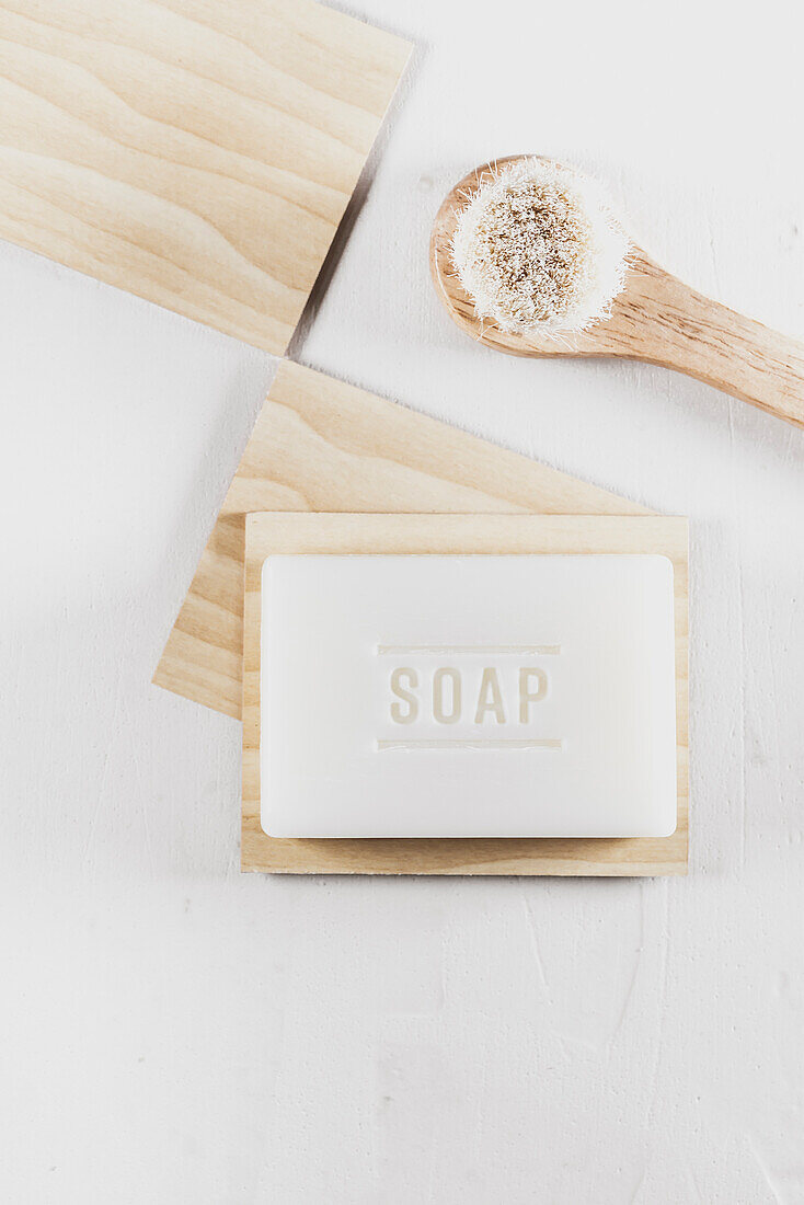 Natural soap with wooden cleaning brush