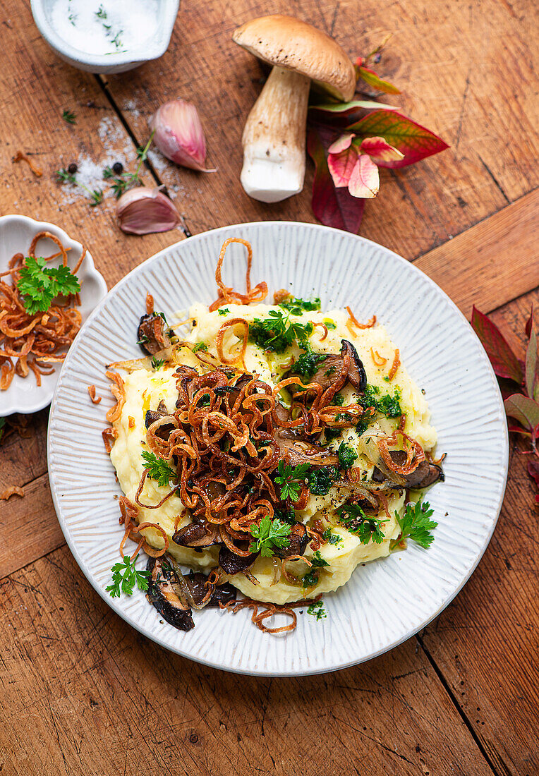 Sauteed mushrooms with celery puree and roasted onions