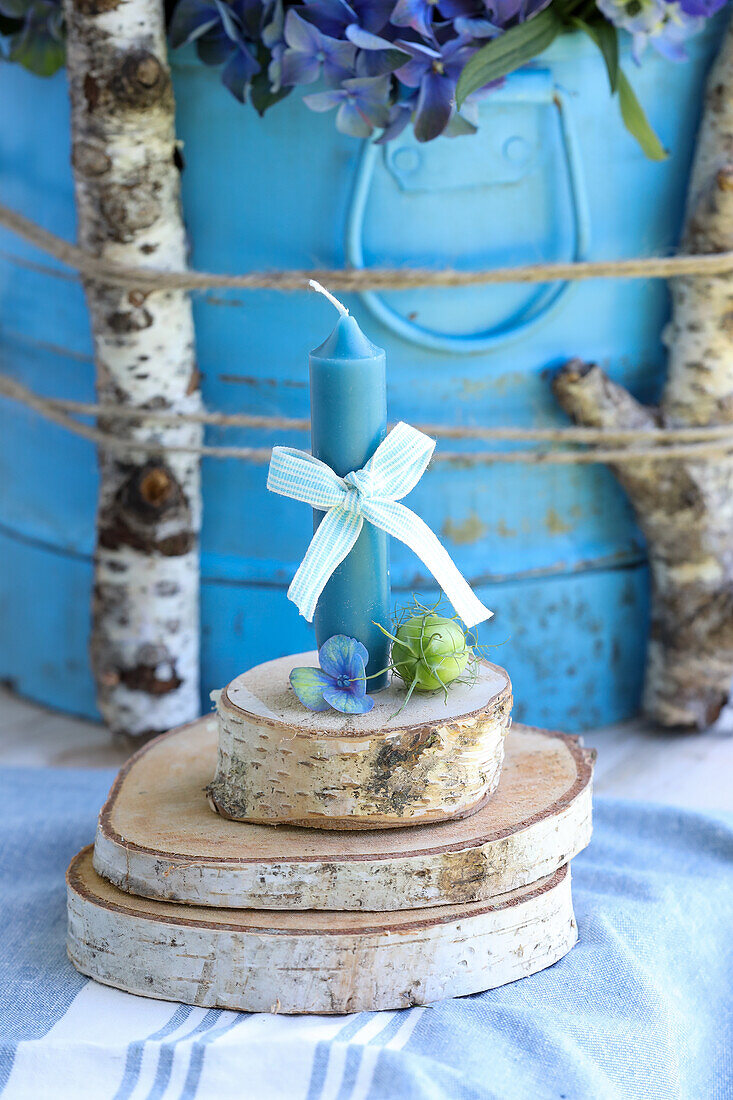 Candles with bows on birch branches