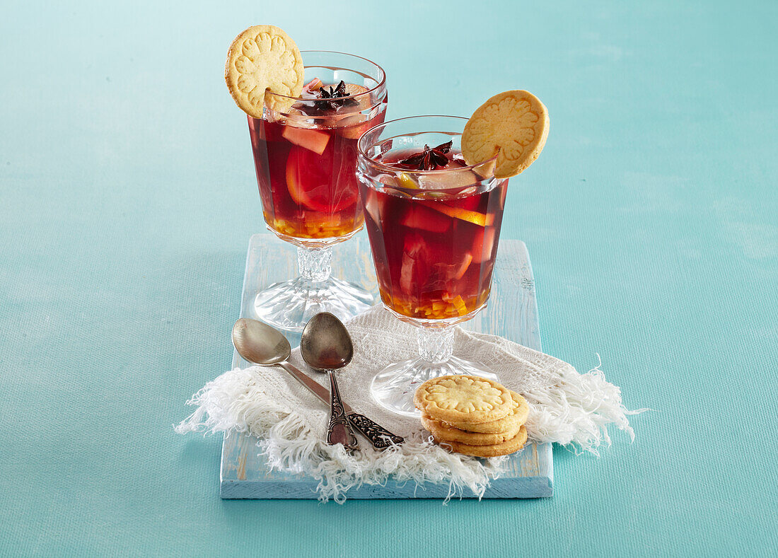 Homemade punch with orange biscuits