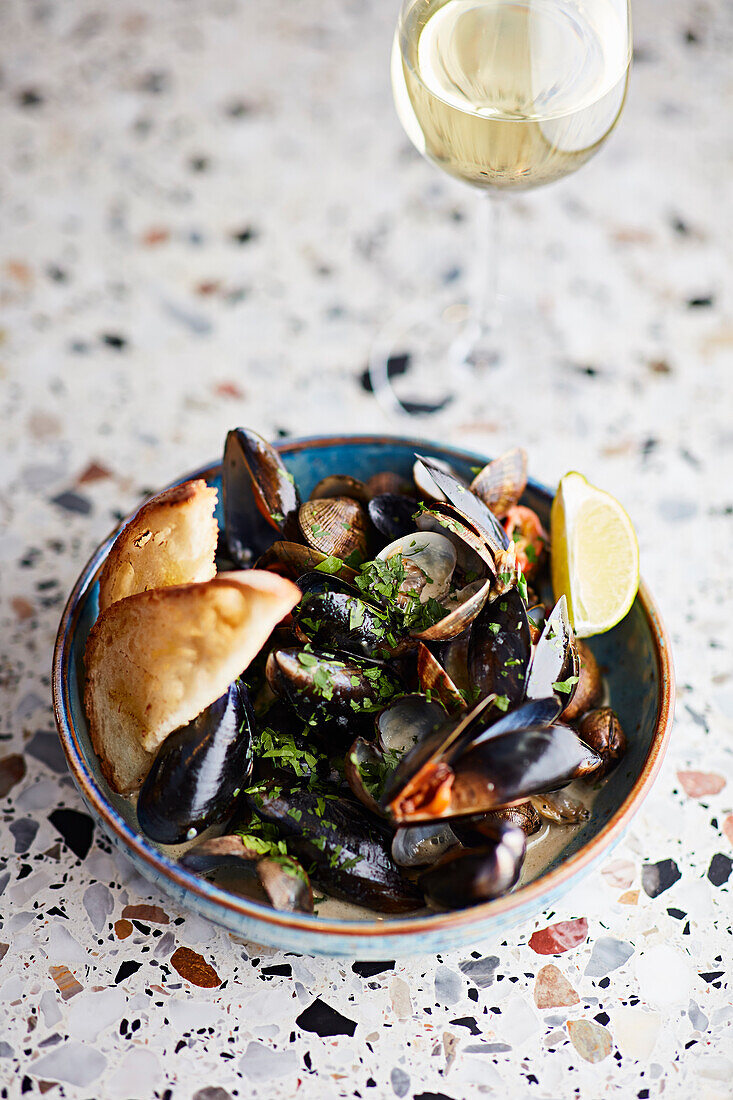 Steamed mussels served with crusty bread