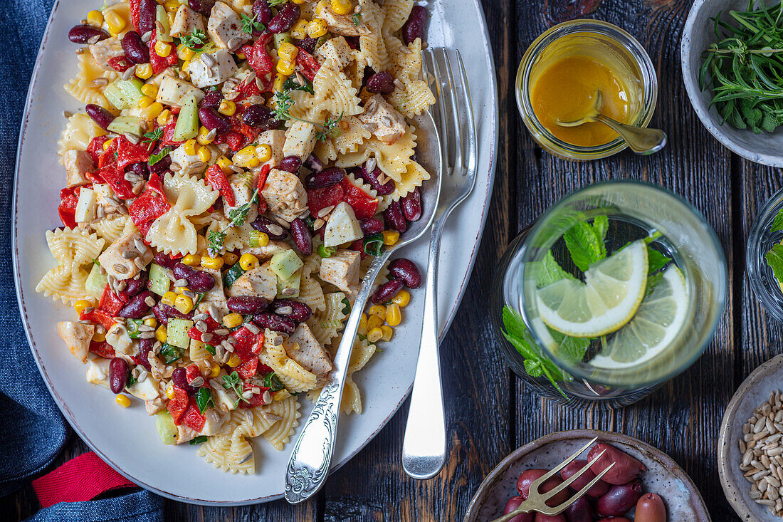 Farfalla salad with chicken, beans, and corn