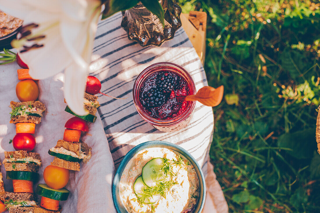 A garden picnic with blackberry-and-chia jam, a cream cheese dip and sandwich kebabs