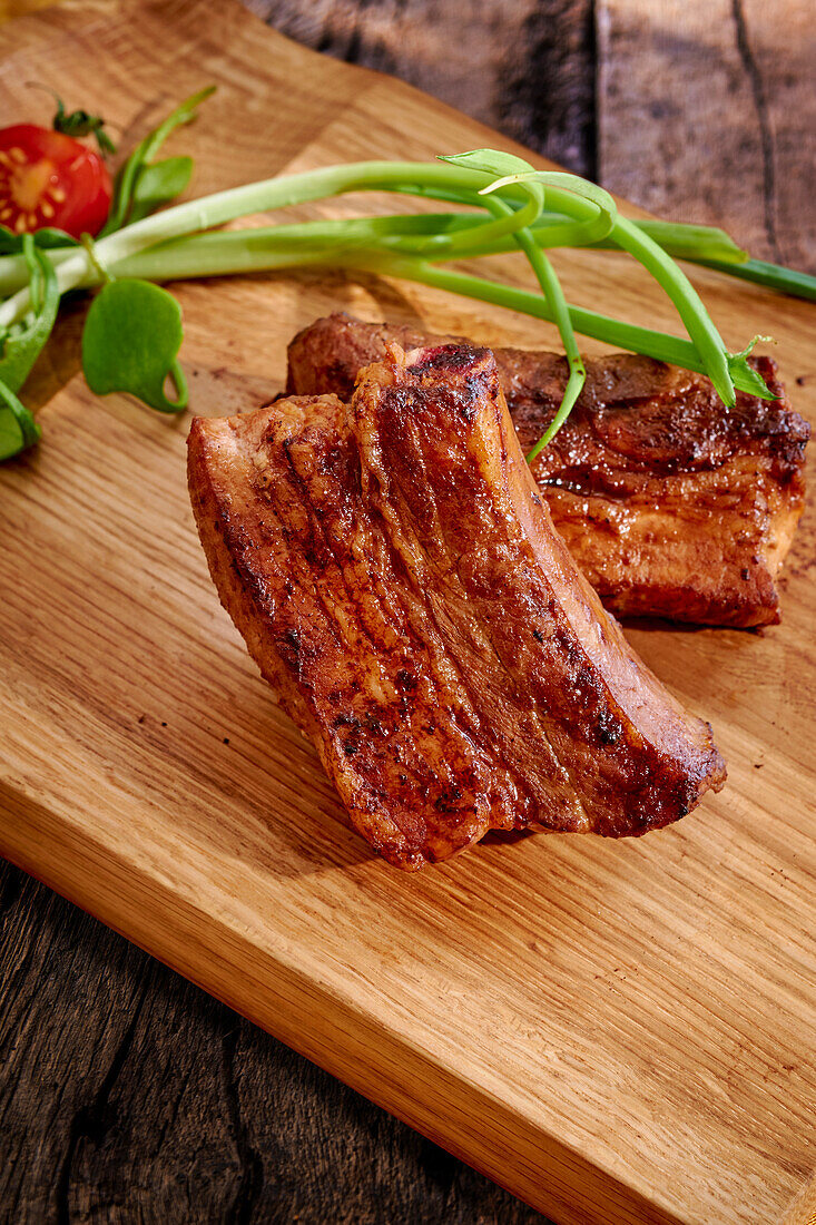 Spareribs on a wooden board