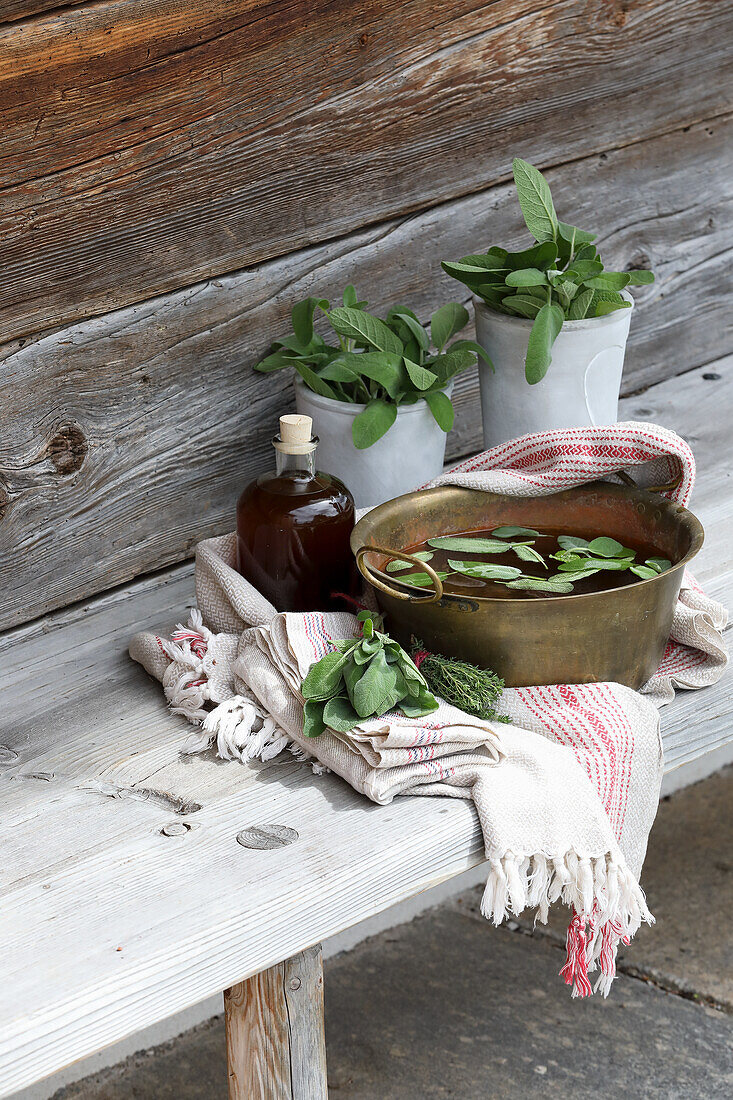 Head steam bath with sage leaves and thyme oil