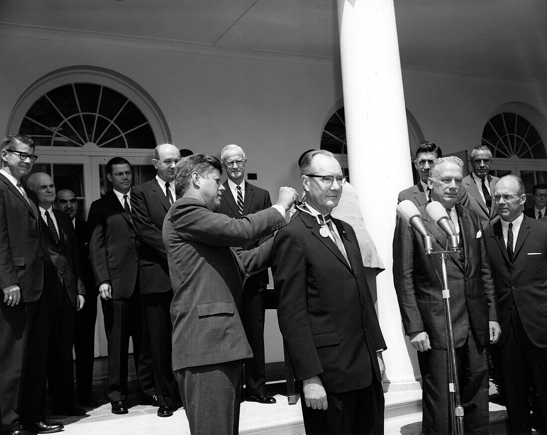 Fred L. Whipple receiving an award from US president