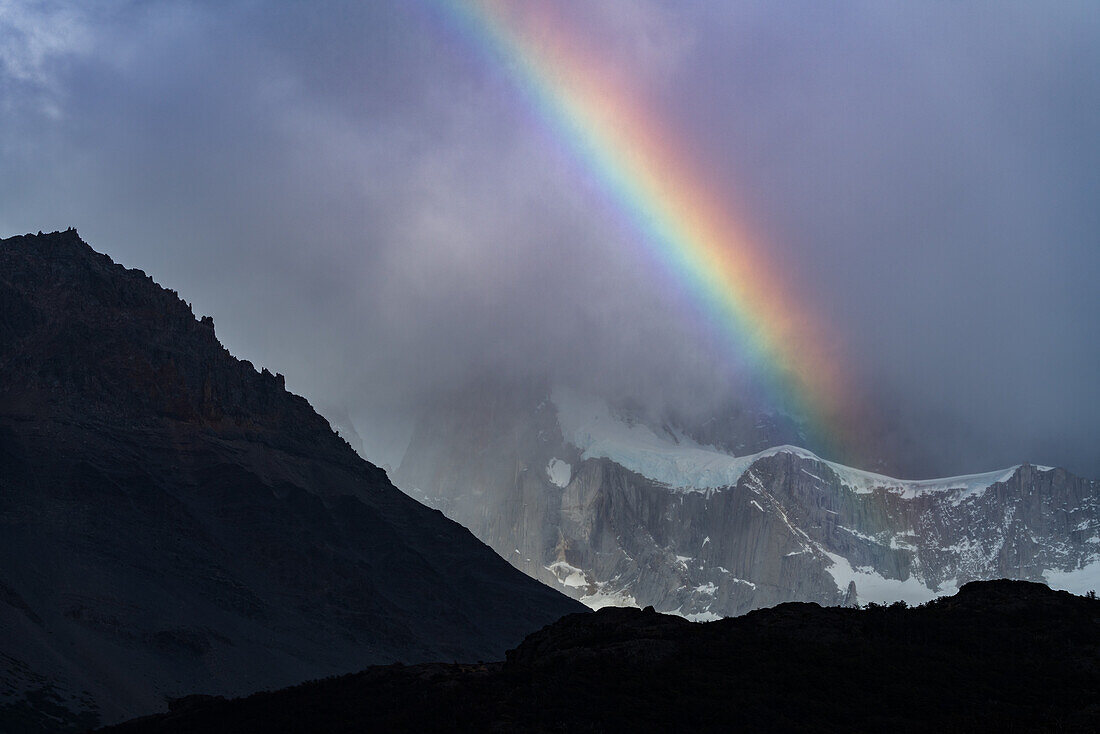 Rainbow in the clouds at the base of Mount Fitz Roy