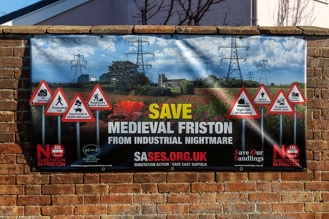 Protest campaign banners against electricity substation