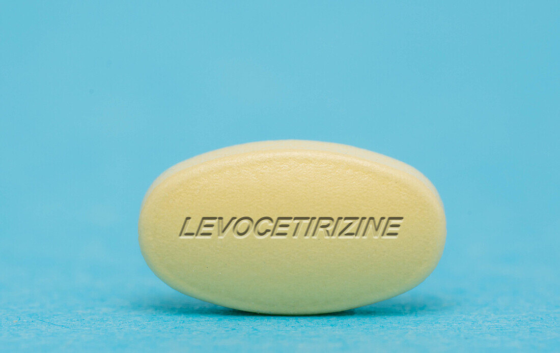 Levocetirizine pill, conceptual image