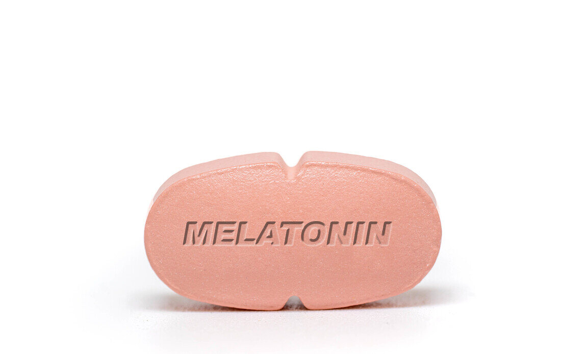Melatonin pill, conceptual image