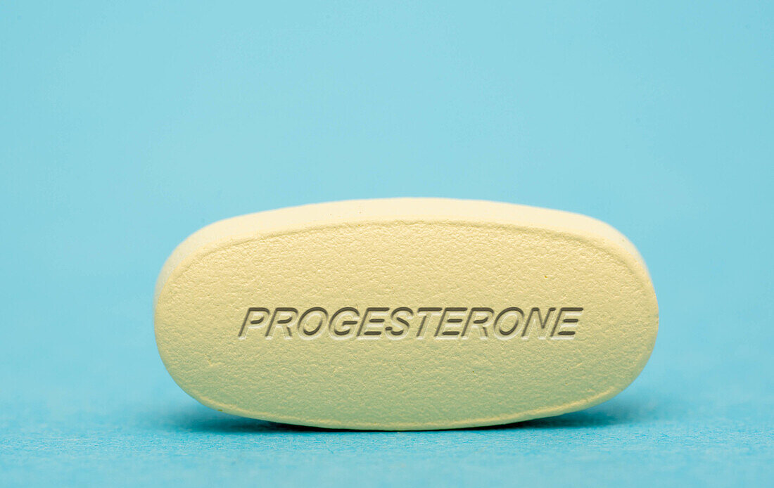 Progesterone pill, conceptual image