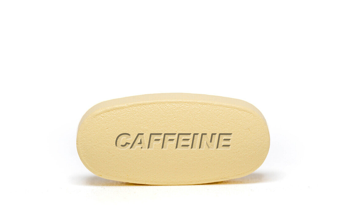 Caffeine pill, conceptual image