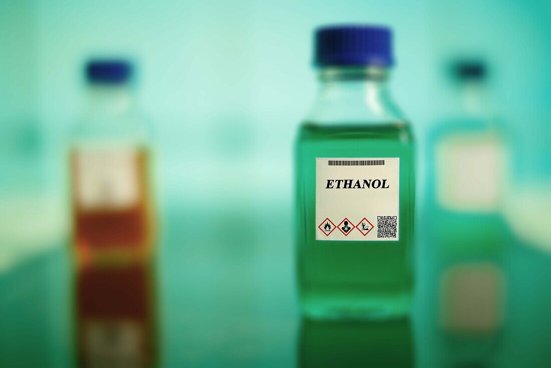 Glass bottle of ethanol biofuel