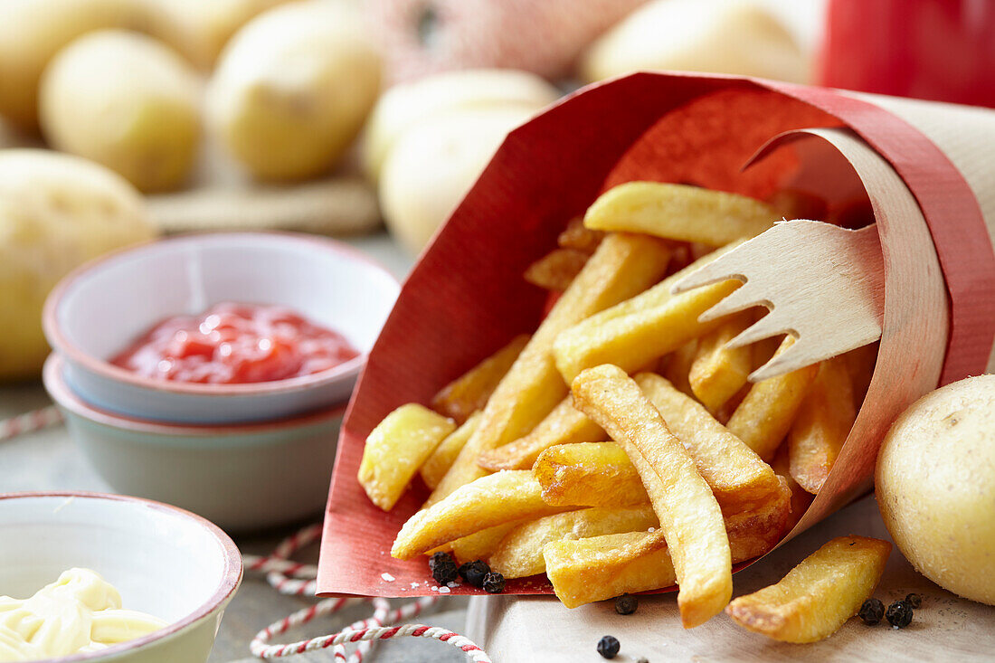 French fries with wooden fork