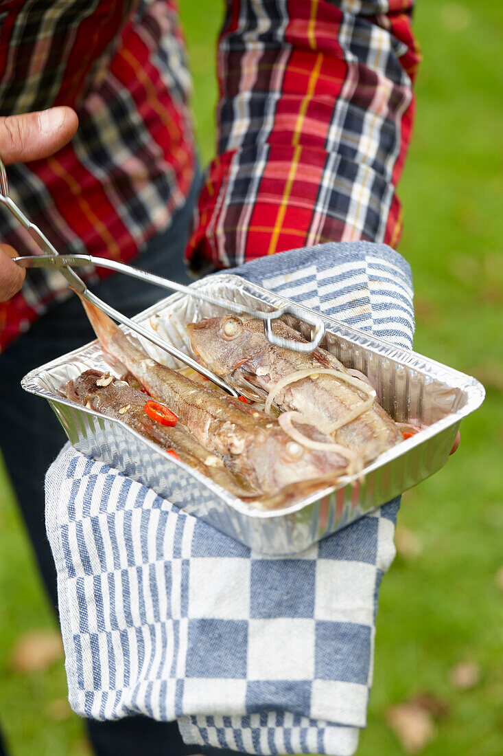 Fish in a barbecue dish