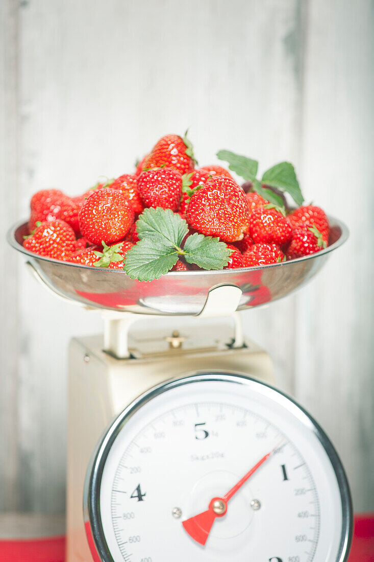 Strawberries in scale