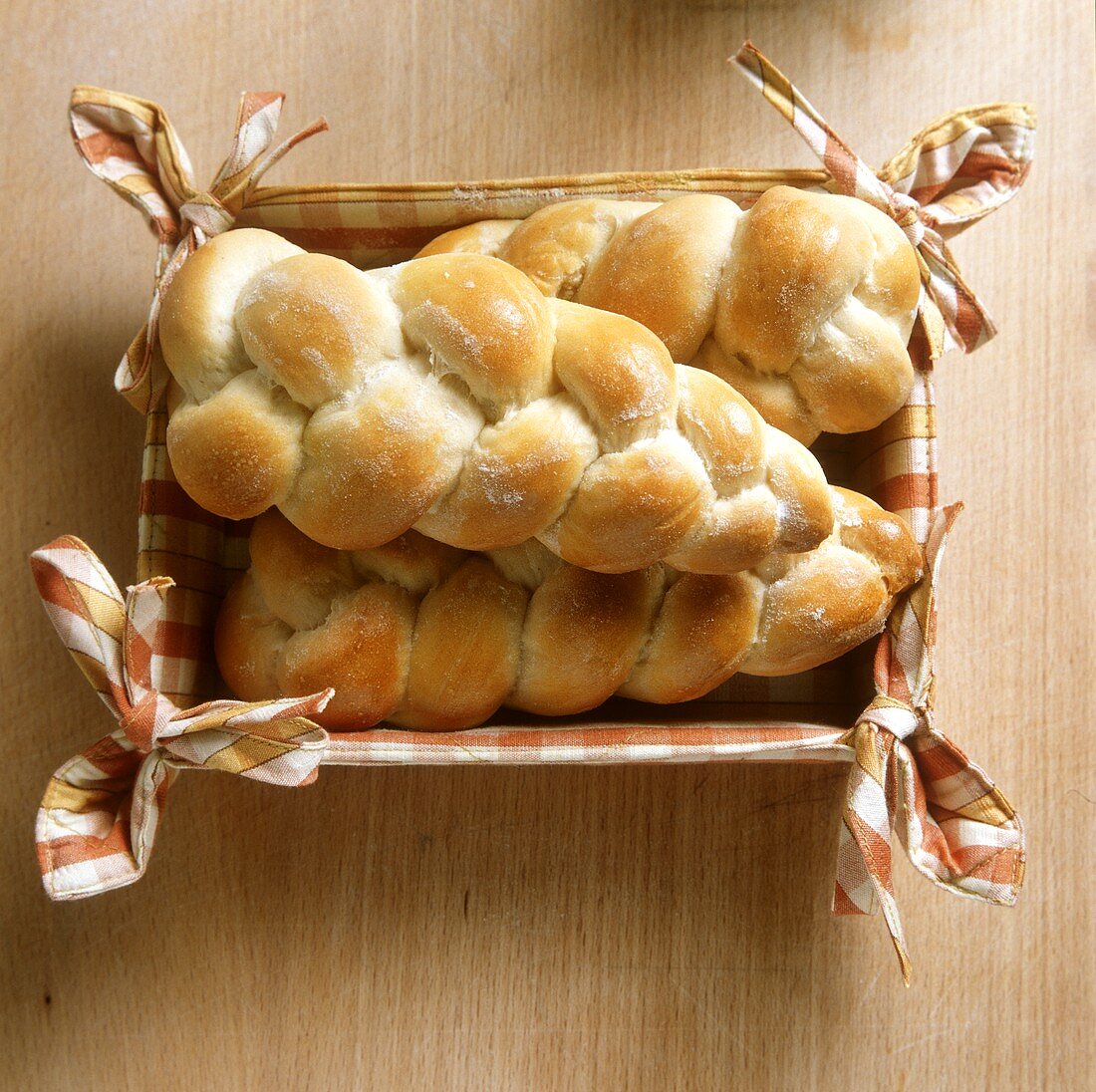 Bread plaits in decorative bread basket
