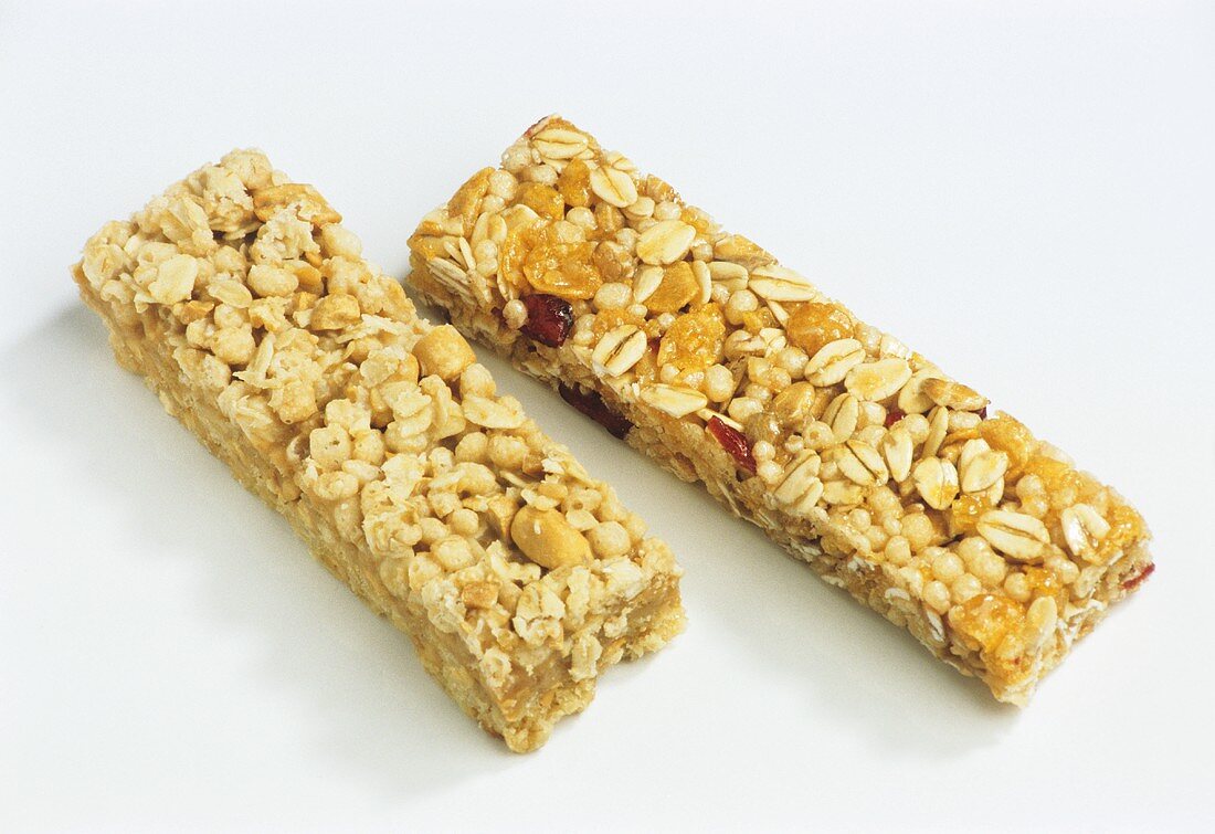 Two muesli bars with fruit and nuts