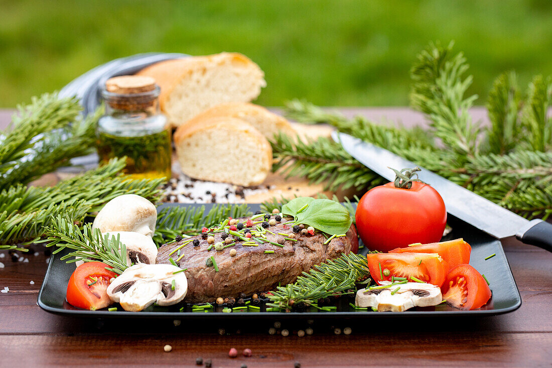 Steak with pine needles