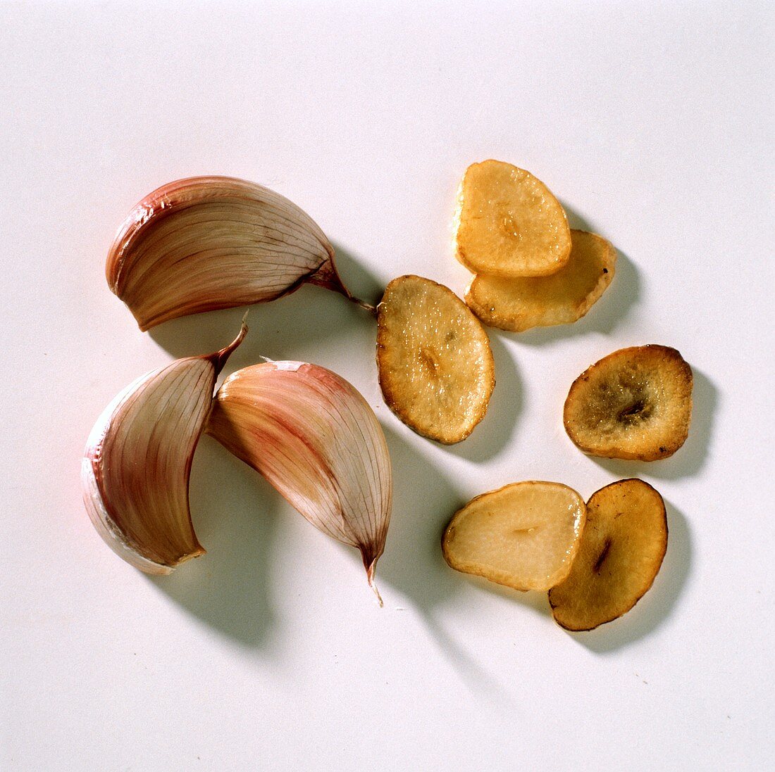 Garlic cloves and roasted garlic slices