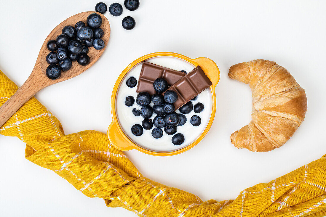 Blueberries and chocolate in yoghurt