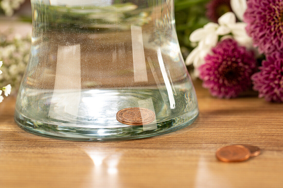 Cent piece in vase