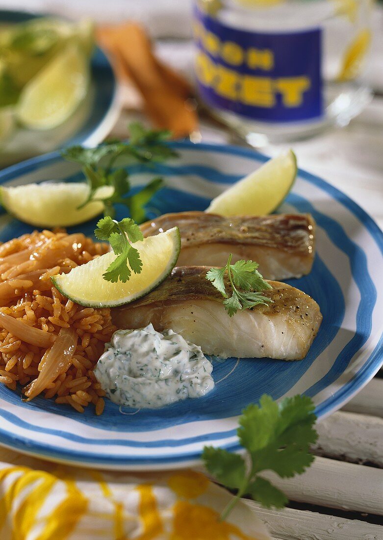 Coley fillets with herb sour cream & tomato rice
