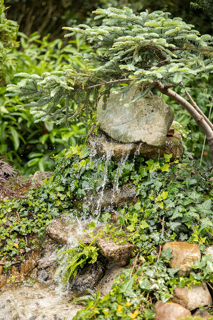 Water feature with stones