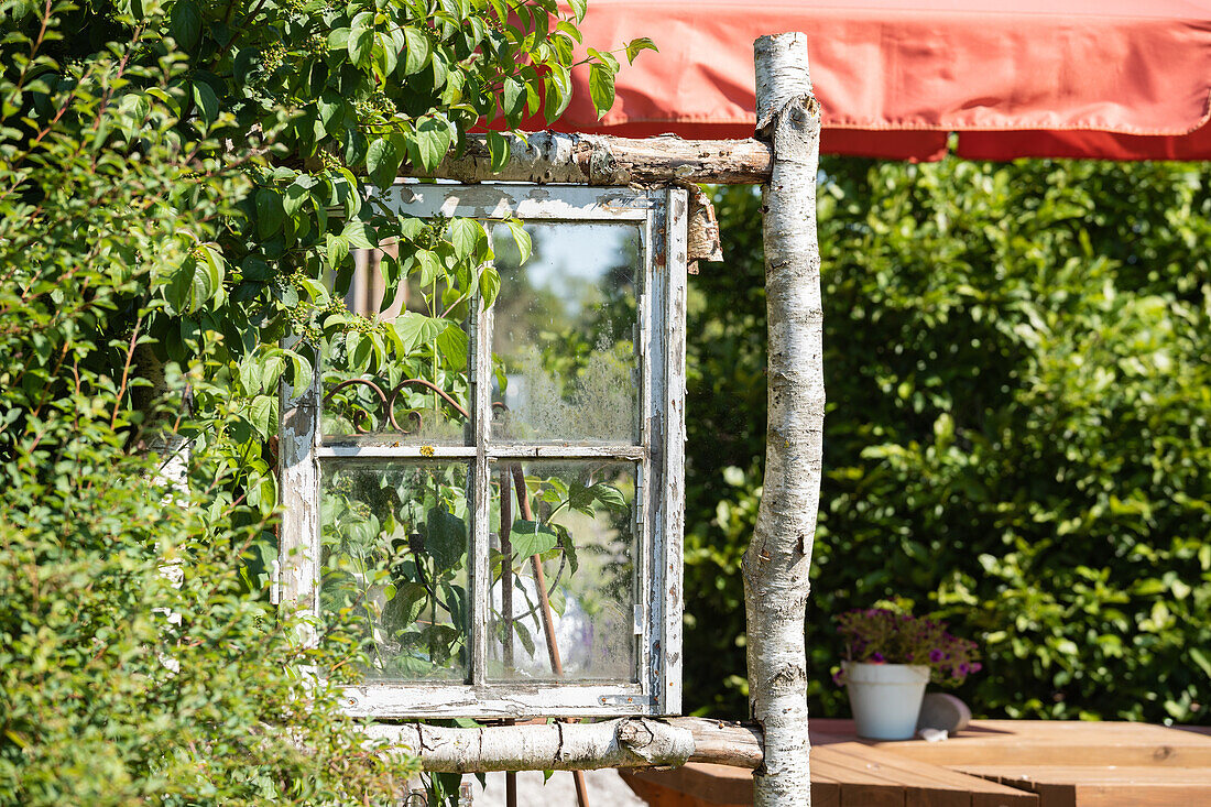 Wooden window in the garden