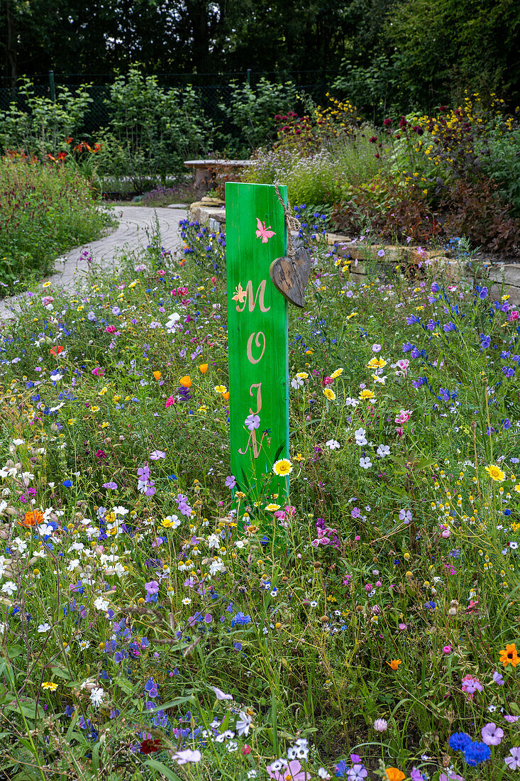 Wildflower meadow with shield