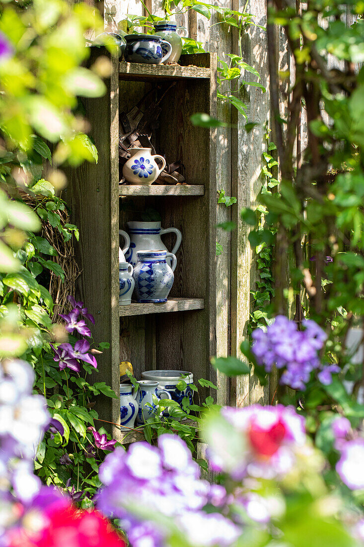 Garden decoration - containers on the shelf