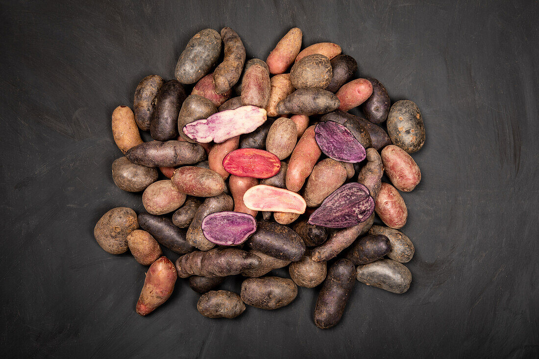 different types of potatoes cut into slices