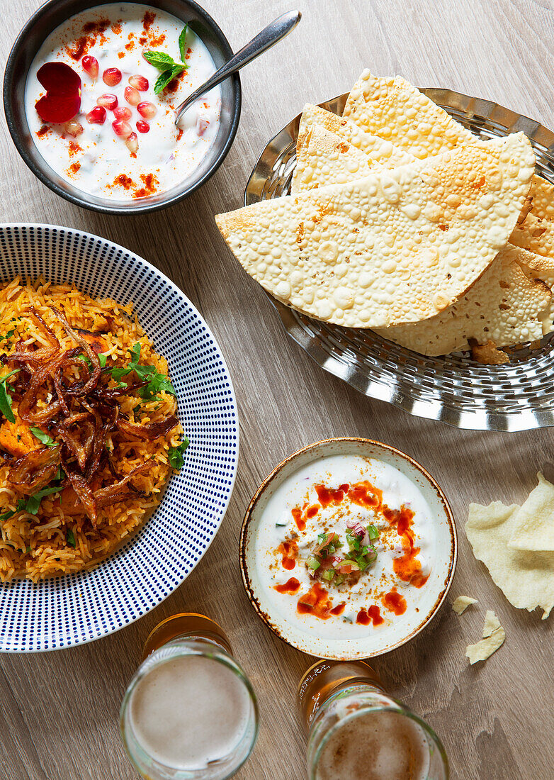 Indian food: Biryani, raita and naan bread