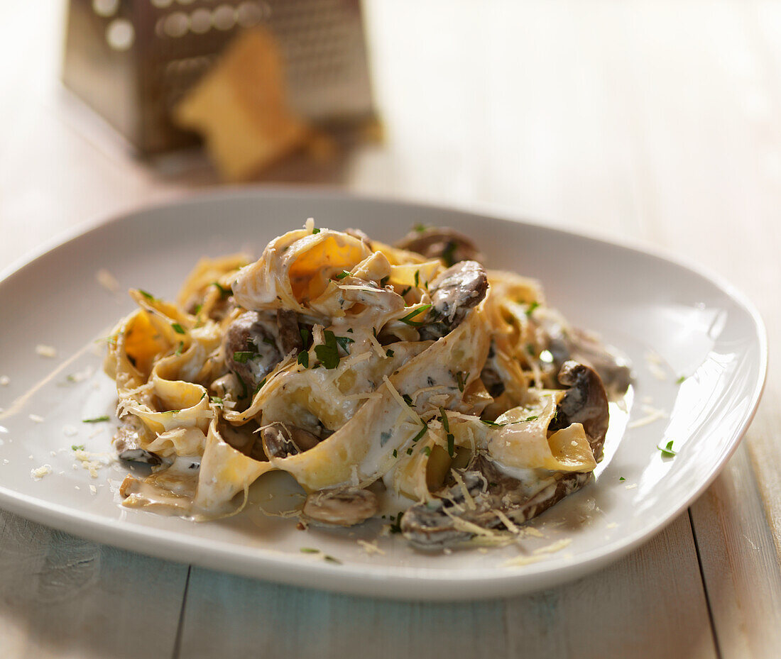 Mushroom papardelle with grated parmesan