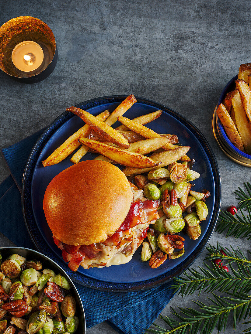 Chicken cheeseburger with Brussels sprouts and chips