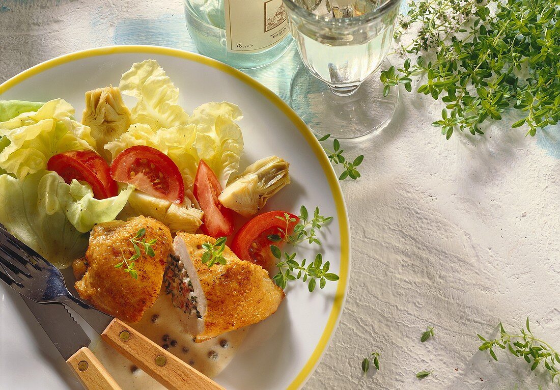 Chicken breast with vegetable stuffing & salad garnish