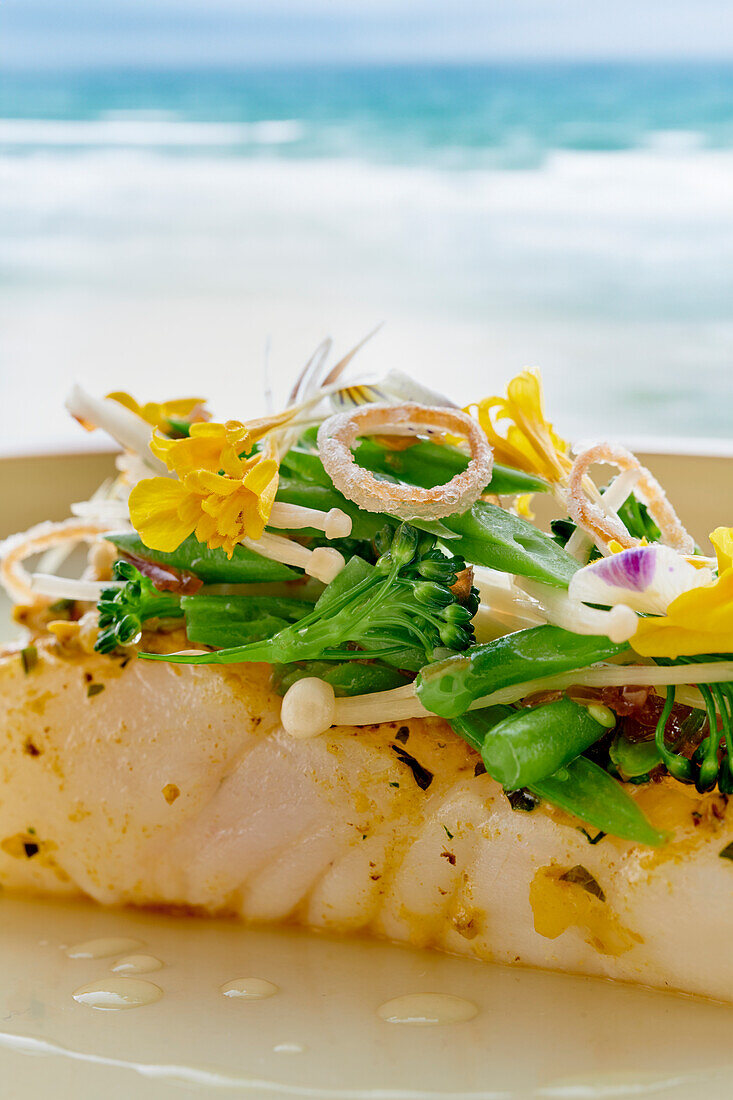 Turbot with vegetables and edible flowers