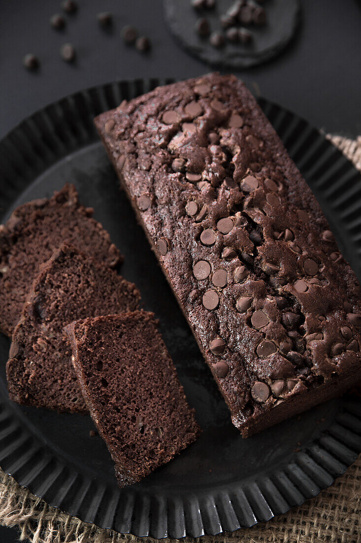 Chocolate banana bread on a black serving plate