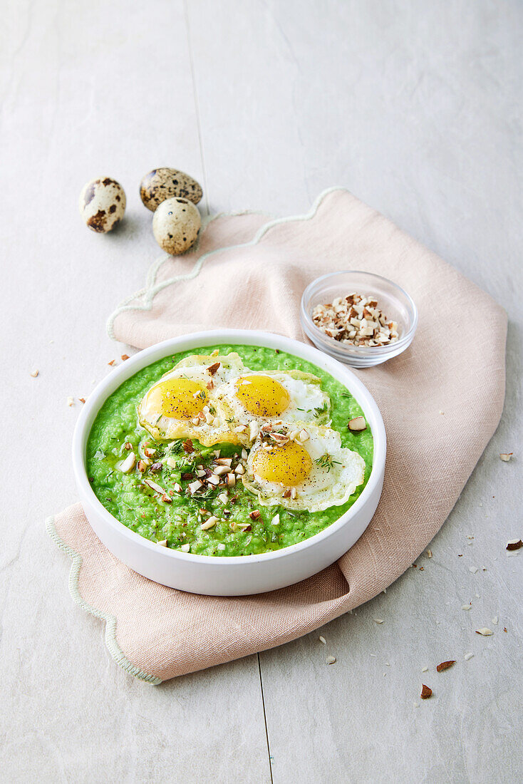 Cream of peas with quail eggs