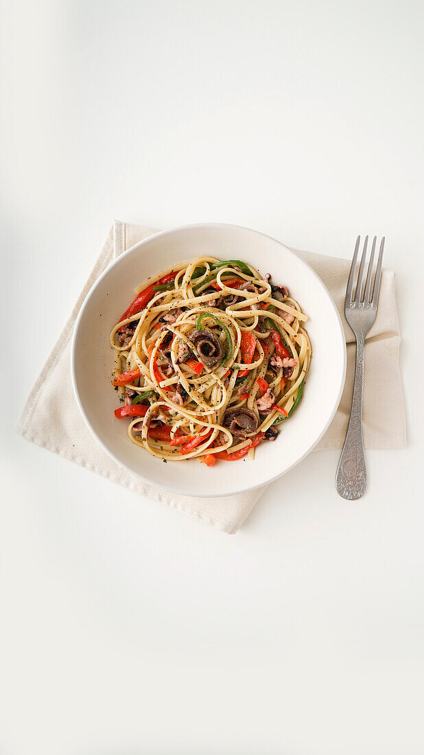 Linguine with octopus, anchovies and peppers