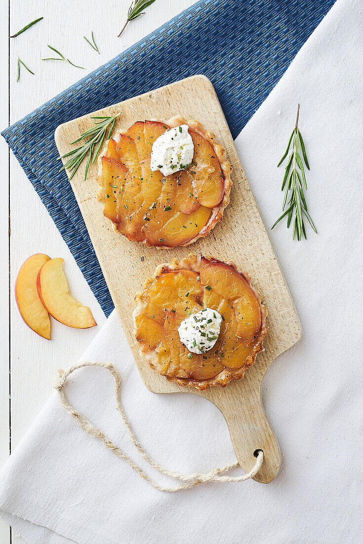 Small wholemeal tarte Tatins with peach and goat's cheese